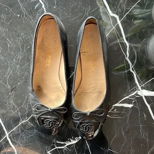 Chanel black leather ballet flats